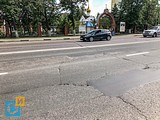 Трещины, колейность, ямы вперемешку с заплатками на Можайское шоссе