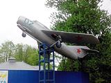 д. Пронское. Памятник — Самолет МиГ-15УТИ (возле входа в лагерь «Радуга»).
